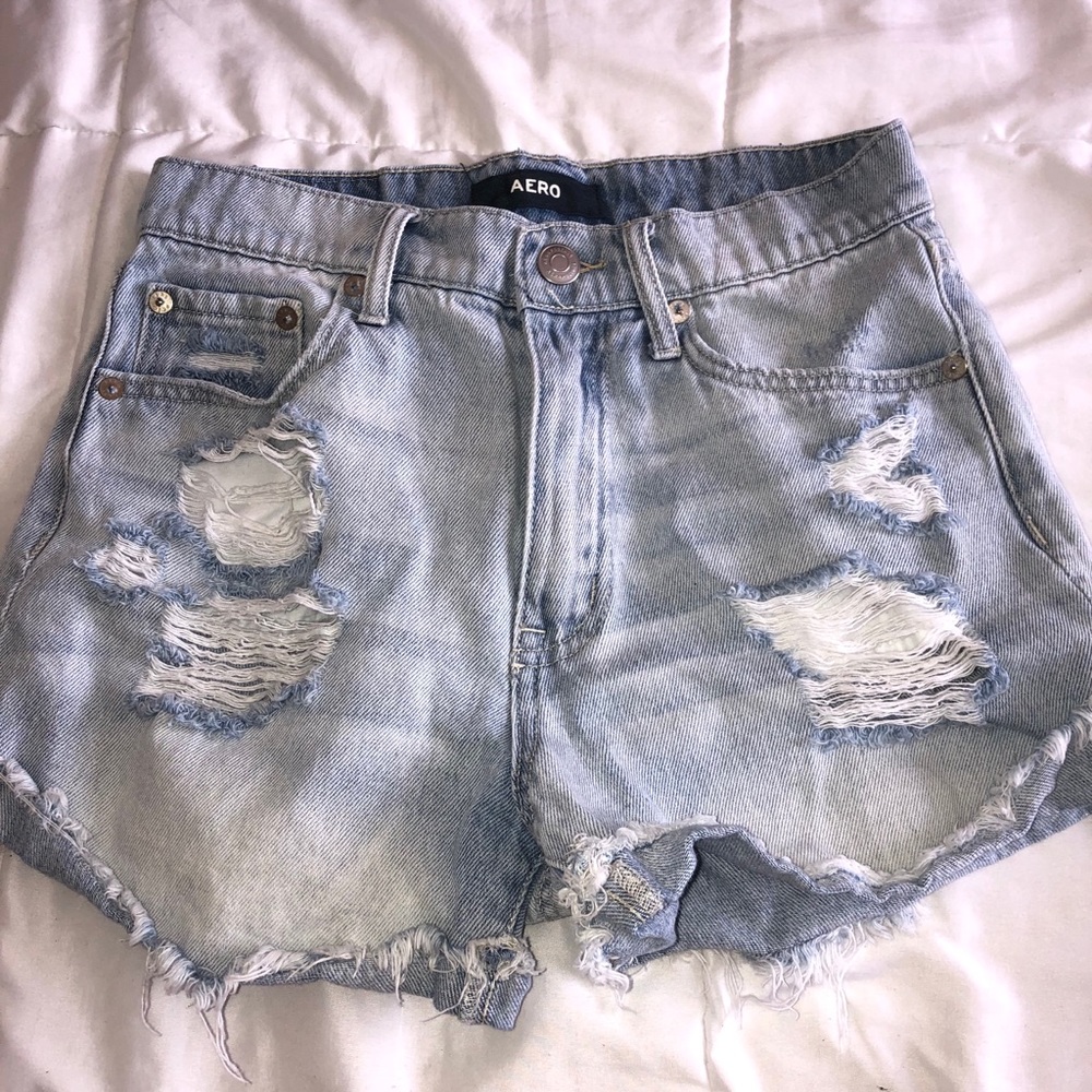 Light wash denim distressed shorts